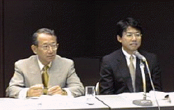 左から、インテル代表取締役会長の西岡郁夫氏とマイクロソフト常務取締役の長谷川正治氏 