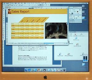 マイクロソフトブースで展示されていた『Excel 10 for Mac OS X』。グラフィックエンジン“Quartz”の機能を用いて、右の写真や、また3Dグラフなどを透明に表示することなどが可能となっている