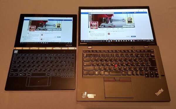 YOGA BOOK（左）は筆者の日常使いの「ThinkPad X1 Carbon」（右）のすべてが2分の1くらいのコンパクトさだ