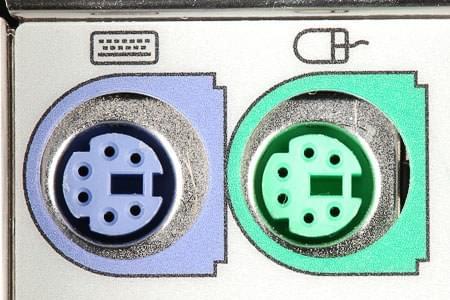 PS/2 ports for keyboards and mice, illustrating how they use an interchangeable format making it too easy to accidentally insert one into the other.