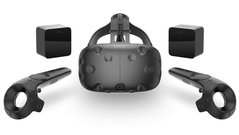 The HTC Vive headset with its Lighthouse sensors and controllers