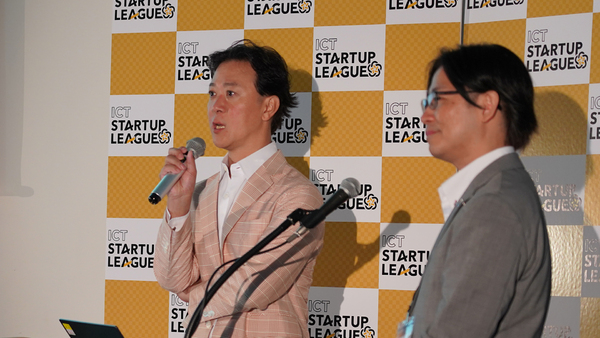 業務実施機関である株式会社みらいワークス代表取締役社長の岡本祥治氏（左）と総務省国際戦略局技術政策課の野間邦夫氏（右）